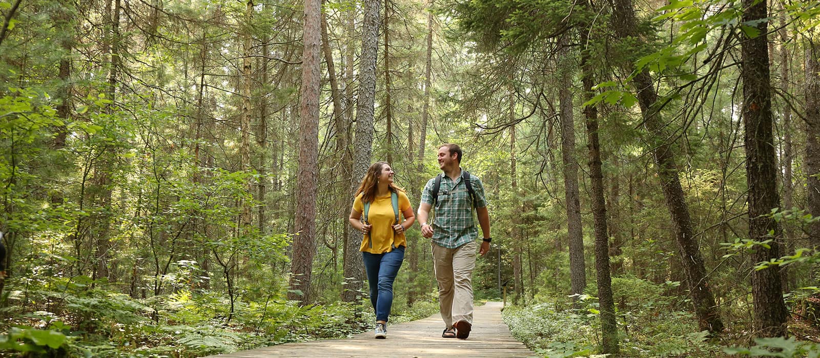 Couple hiking on the trail in springtime
