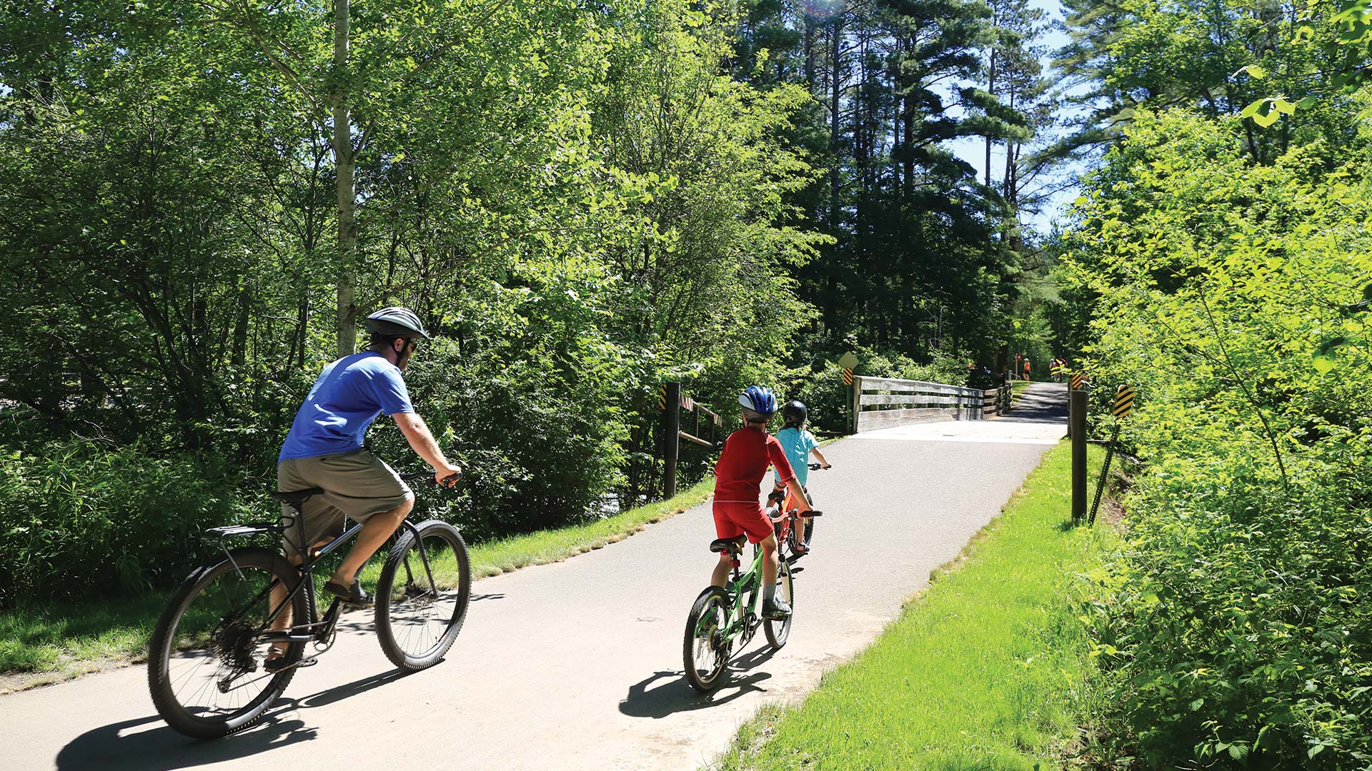 Family biking the Heart of Vilas Trail