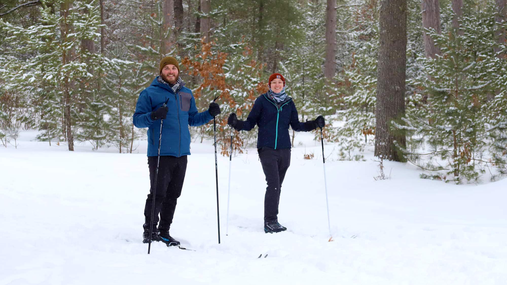 Couple cross-country skiing at Boulder Junction Winter Park Wisconsin