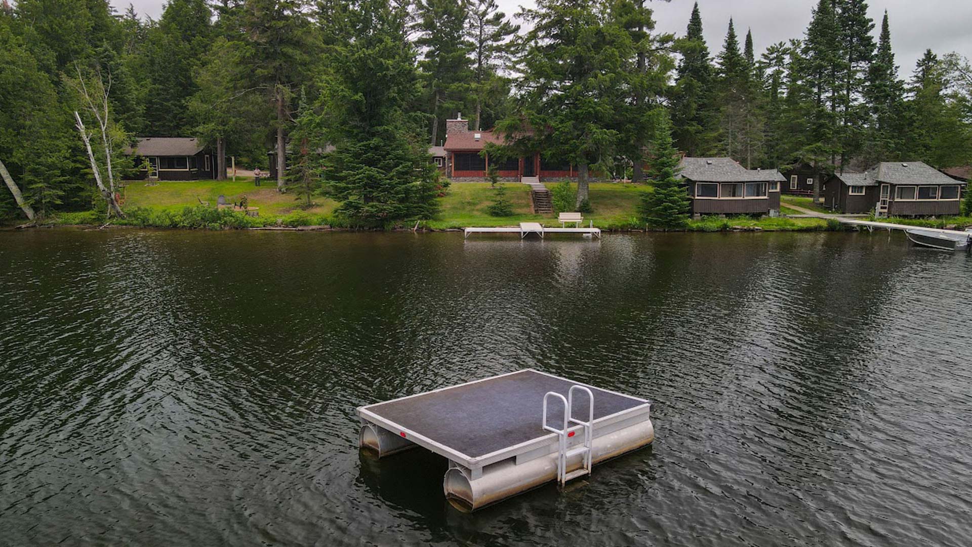 A floating dock in front of Evergreen Lodge