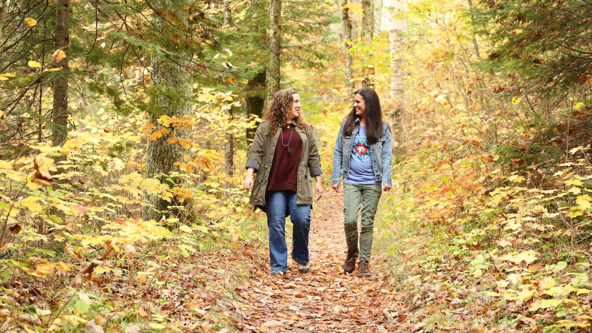 Women hiking on Fallison Lake Nature Trail Boulder Junction WI