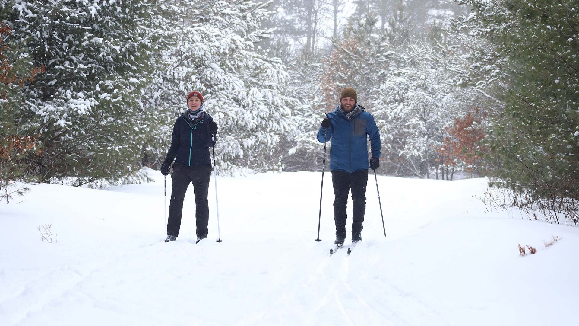 Couple cross-country skiing at Winter Park