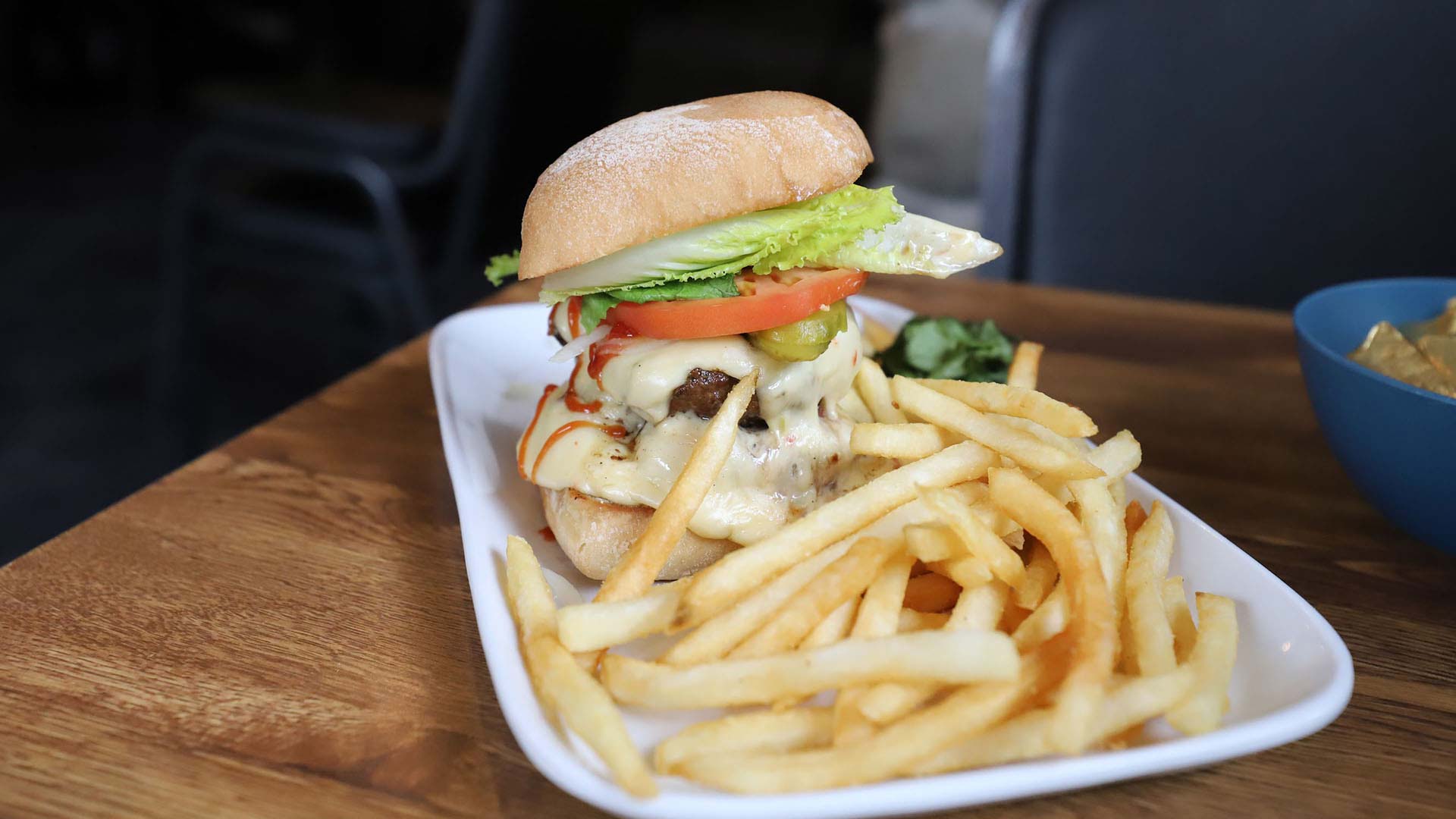 Plated burger and fries at Gooch's