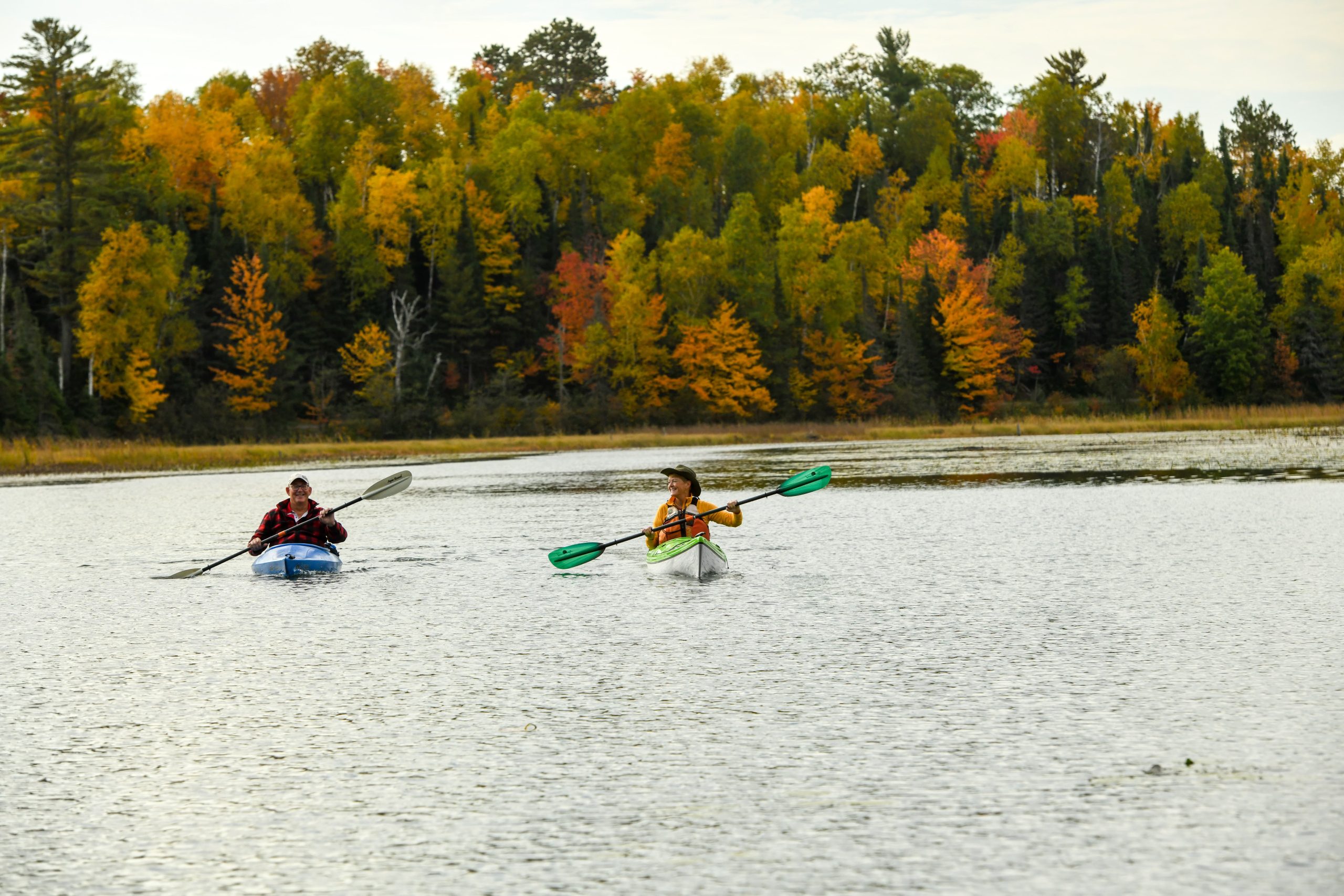 two people padding during fall 